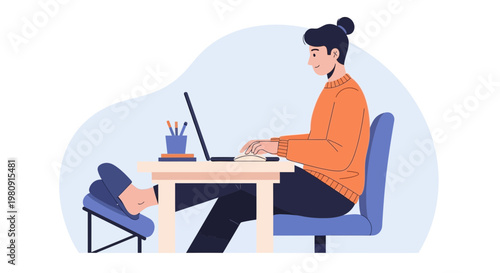 Young man working on laptop at desk, feet up on footrest, casual home office setup