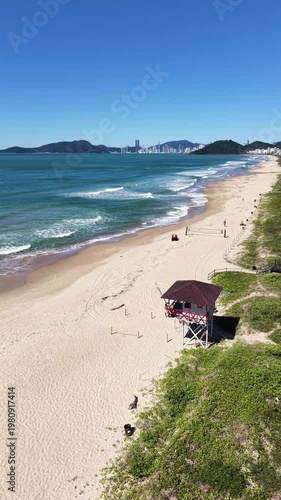 Beach, Ocean and City Skyline Surrounded by Nature