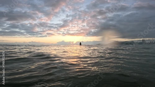 Surfing at Sunrise in the Ocean – Golden Morning Waves