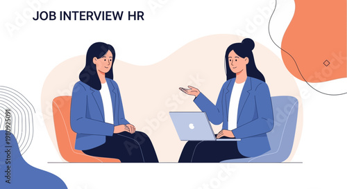 Job Interview HR: Two women in business attire discussing during an interview.