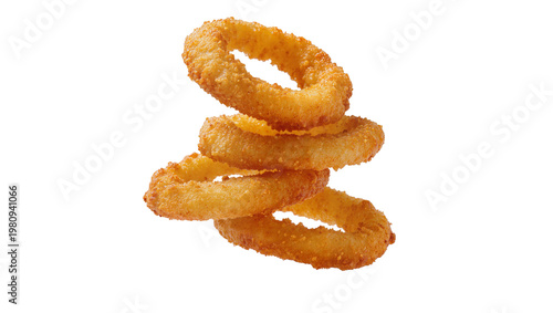 Isolated stack of golden fried crunchy battered onion rings for delicious fast food snack