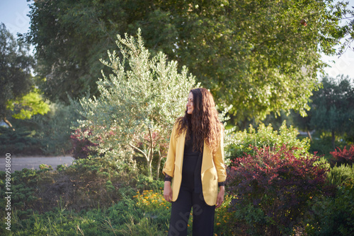 Portrait of a young beautiful brunette woman against the backdrop of the nature of northern Israel
