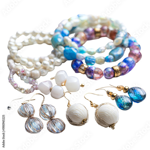 Grouped jewelry; bracelets and earrings of various designs and colors against black background
