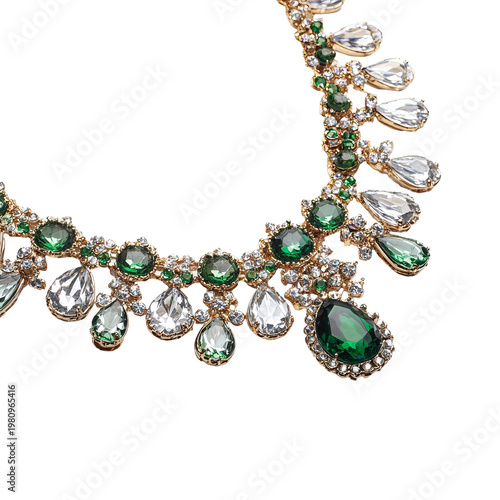 Luxurious, jeweled necklace with emerald and white gemstones against black backdrop