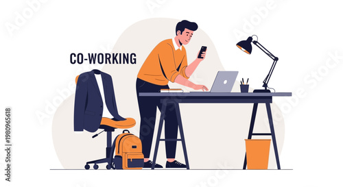 Man working in co-working space with laptop, phone, and desk setup