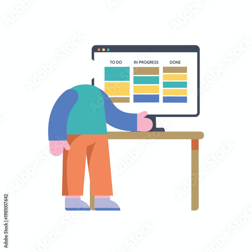 Person at desk standing and using computer monitor.