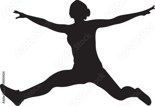 Silhouette of a woman jumping in a split leap