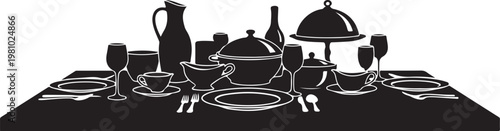 Black and white table setting with dinnerware and glassware