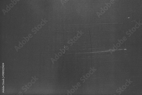 grunge scratch and dust on black background,retro noisy grain dust texture for film or photo overlay,old photo overlay texture,black grainy background with dust and scratch,worn paper background