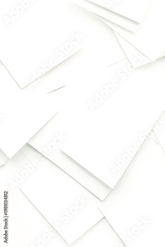 Stacked white papers on a surface. vertical frame