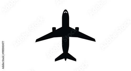 Overhead view of a commercial airplane sharply defined in black silhouette