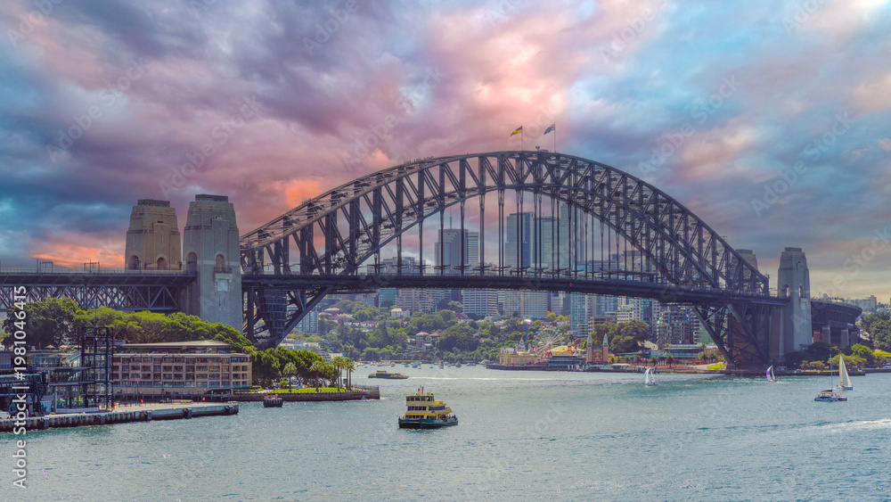 Fototapeta premium Panoramic view of Sydney Harbour and Circular Quay on a Beautiful Autumn Afternoon lovely colours of the sky in Sydney NSW Australia