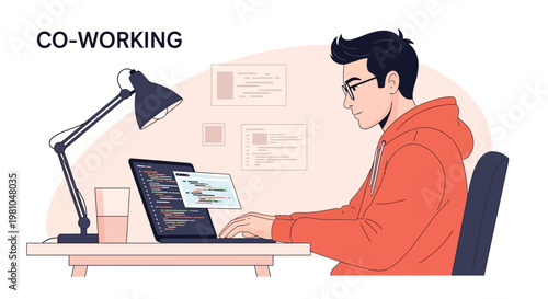 Young man coding on laptop in co-working space, focused on programming