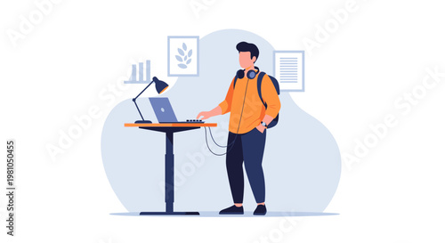 Young man working on laptop at standing desk, wearing headphones and backpack
