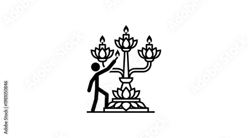 Person Lighting Candles on a Lotus-Shaped Candelabra