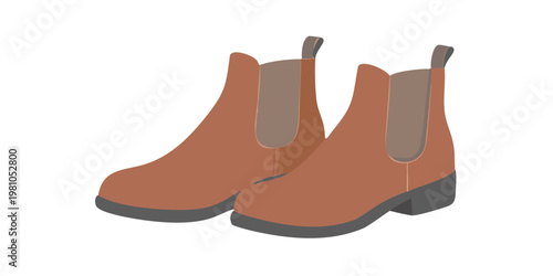 A pair of orange ankle boots with gray soles are displayed