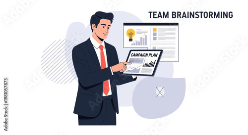 Businessman presenting campaign plan on tablet during team brainstorming session