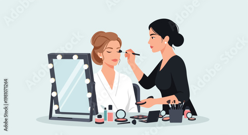Professional artist applies makeup to a woman sitting before a lit vanity mirror