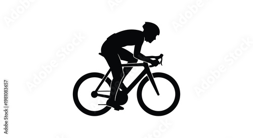 A cyclist in motion captured as a striking black form silhouette