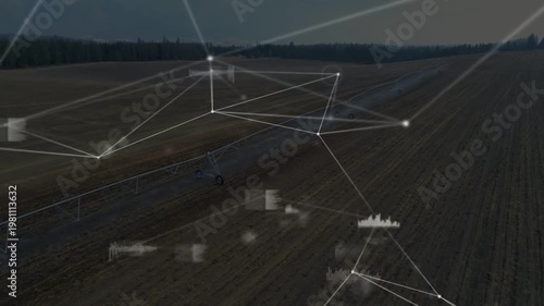 Digital HUDs fading, drone tracking center-pivot arm and wheel across tilled field monitoring soil