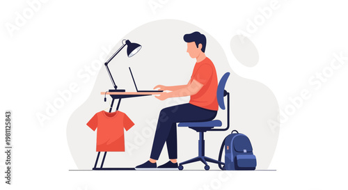 Young man working on laptop at desk, orange t-shirt and backpack nearby