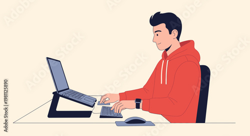 Young man working on laptop at desk, typing on keyboard, modern home office setup