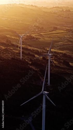 Wallpaper Mural Aerial shot of a wind farm on a ridge, showcasing renewable power. Torontodigital.ca