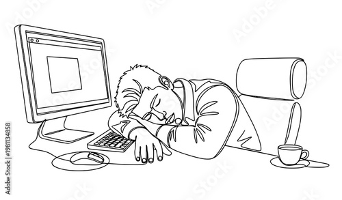 A tired businessman sleeping at his desk in front of a computer