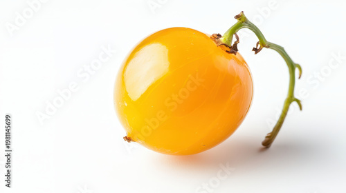 Bright yellow gooseberry with smooth surface, showcasing its vibrant color and natural stem, evokes freshness and vitality