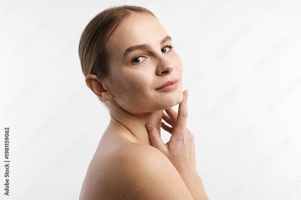 Naklejka premium Portrait of beautiful woman on white background