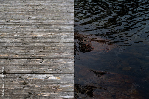 wooder pier and water juxtaposed