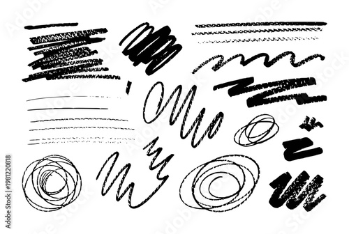 Collection of black hand-drawn scribbles, lines, and smudges white background brush