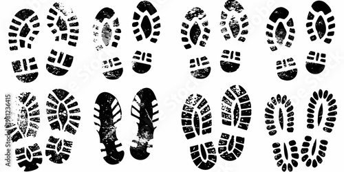 Collection of black shoe prints arranged in a grid pattern