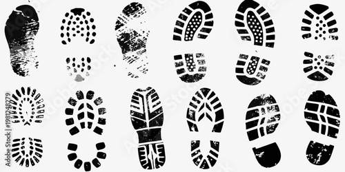 Collection of various black footprints and shoe sole impressions