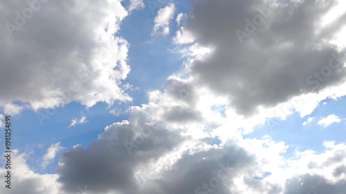 Dark clouds trying to cover the shining sky