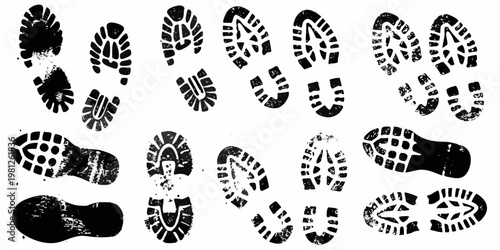 Collection of black shoe prints and footprints on a white background