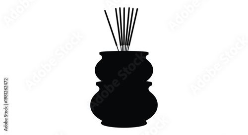 Black incense burner with rising smoke a striking silhouette