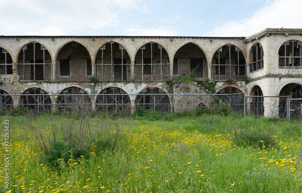 Fototapeta premium Saint panteleimon monastery, a historic religious building in cyprus, stands abandoned, showing decay with its bell tower. Northern Cyprus abandon orthodox christian church