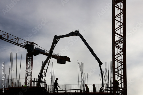 Canvastavla Construction Site with Concrete Pump Truck Pouring Cement into Steel Foundation