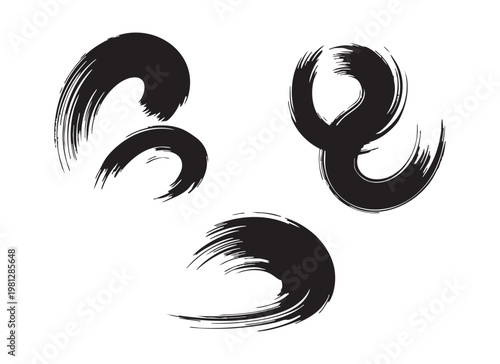 Set of three abstract black ink brush strokes, perfect for design elements or artistic flair