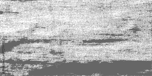 A dark aged grunge texture background featuring a rough black and white surface of old dirty concrete and weathered grey paint on an antique canvas