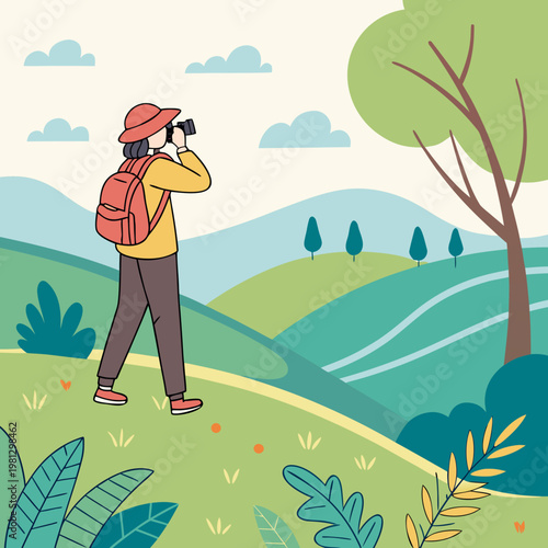 A man with a backpack looking through binoculars on a hill