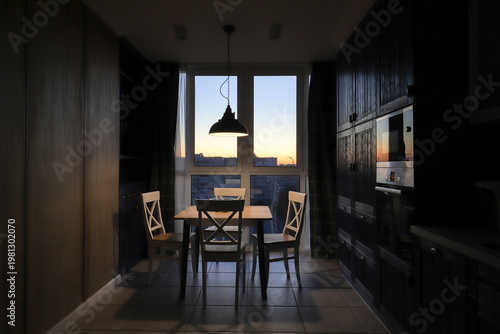 Dining table in the kitchen interior
