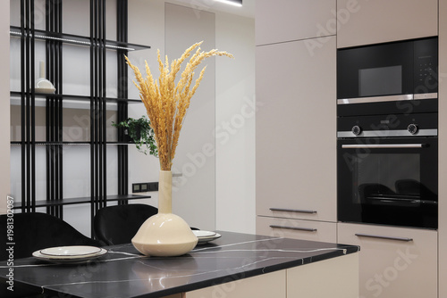 Island table in the kitchen in the interior