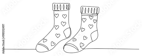 Pair of socks with heart pattern one line drawing continuous line art cozy clothing minimalist vector illustration