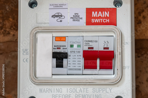 Residential EV Charging Circuit Breaker Box with Surge Protection on brick Wall
