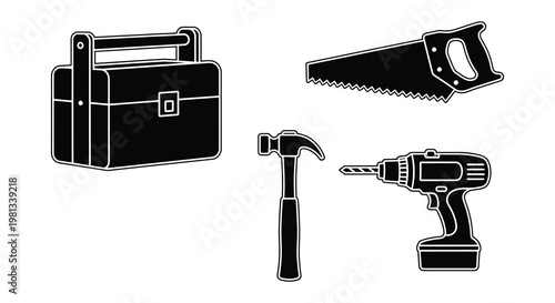 Black toolbox handsaw hammer and drill in a stark silhouette