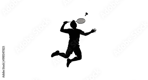 Silhouette of a badminton player jumping to hit shuttlecock during a match.