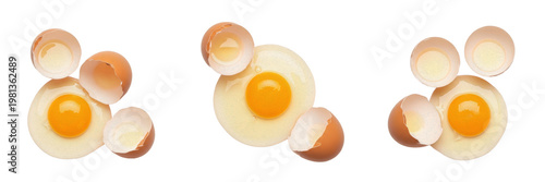 Tableau sur toile Collection of Raw Cracked Chicken Eggs with Vibrant Yellow Yolks and Brown Eggsh