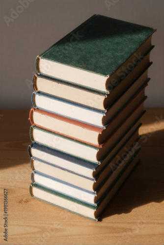Stacked Assorted Books Golden Light